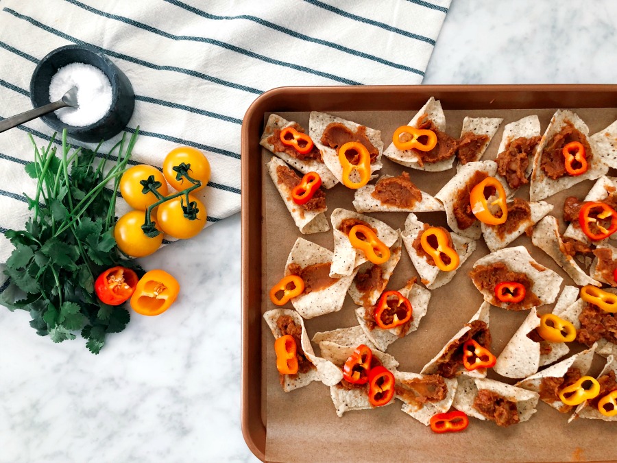 Grain-free sheet pan nachos! Takes just 10 minutes in the oven! Vegetarian + healthier without losing the flavor!