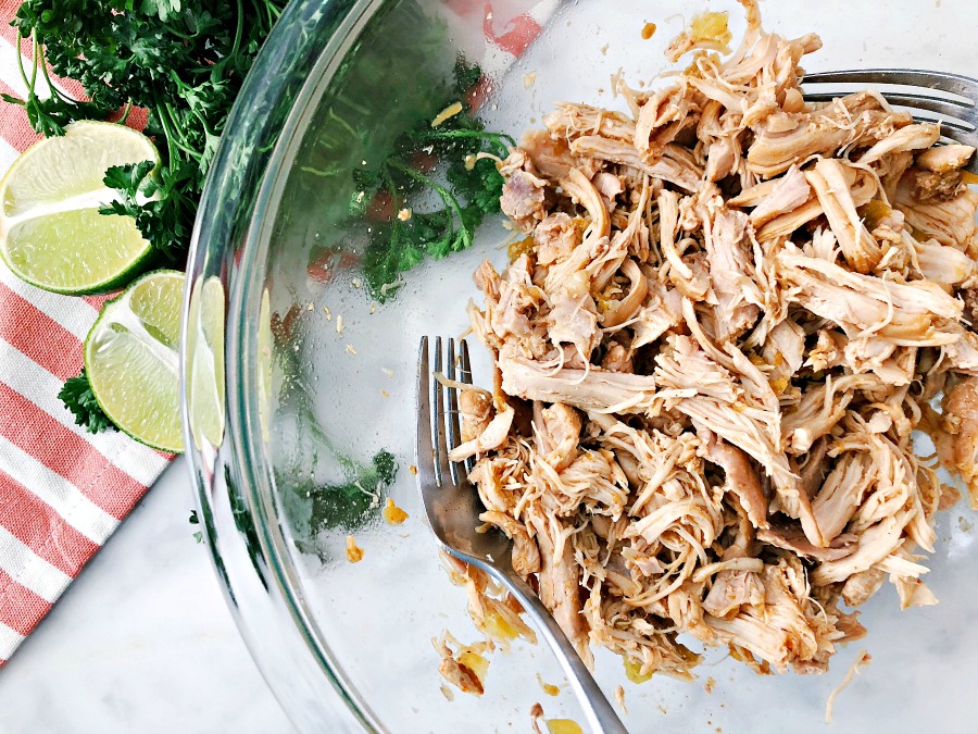 Quick, versatile and and delicious Paleo Instant Pot Shredded Chicken Taco Bowls from frozen meat! Dinner to the table in 20 minutes!