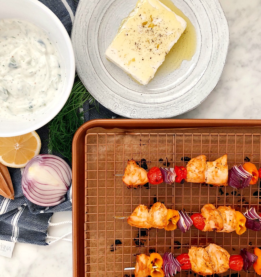Easy, delicious weeknight meal! These gluten-free chicken kabobs are flavorful and juicy! Served with fresh, homemade tzatziki sauce!