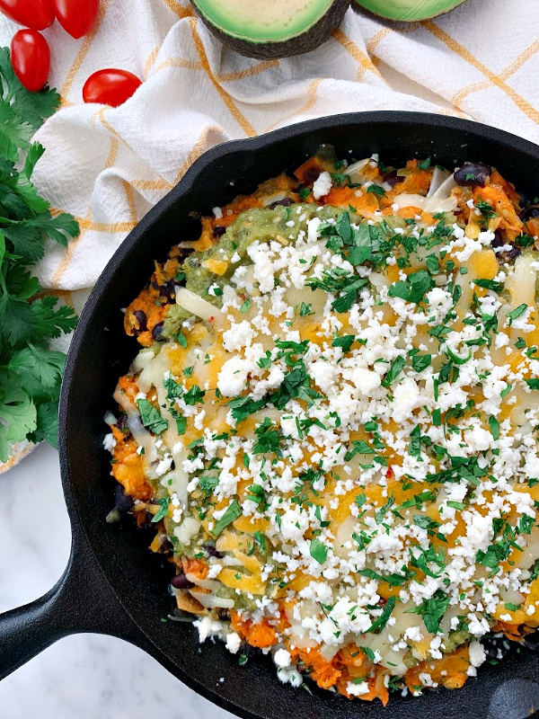 Delicious weeknight meal! This flavor-packed, cheesy enchilada casserole is filled with delicious salsa verde and roasted vegetables!