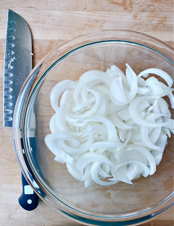 Buttery, salty, mouthwatering caramelized onions!! The best burger topping for your summertime burgers! Also delicious on hot dogs, bratwurst, sausages, and tacos!