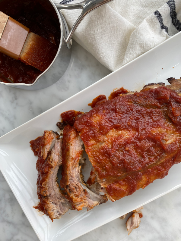 This homemade BBQ sauce is equal parts sticky, sweet and savory! It is insanely easy and uses real ingredients! Perfect for oven baked ribs!